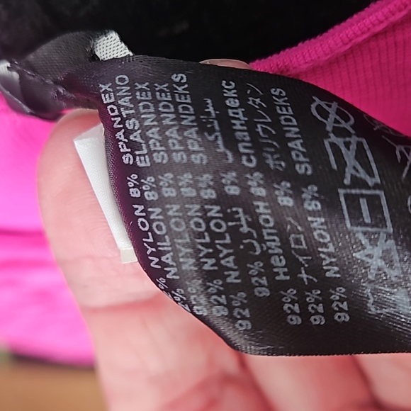 Bebe Ellie Off-The-Shoulder Perforated Bandage Shine Dress in Fuchsia Pink - Picture 3 of 5